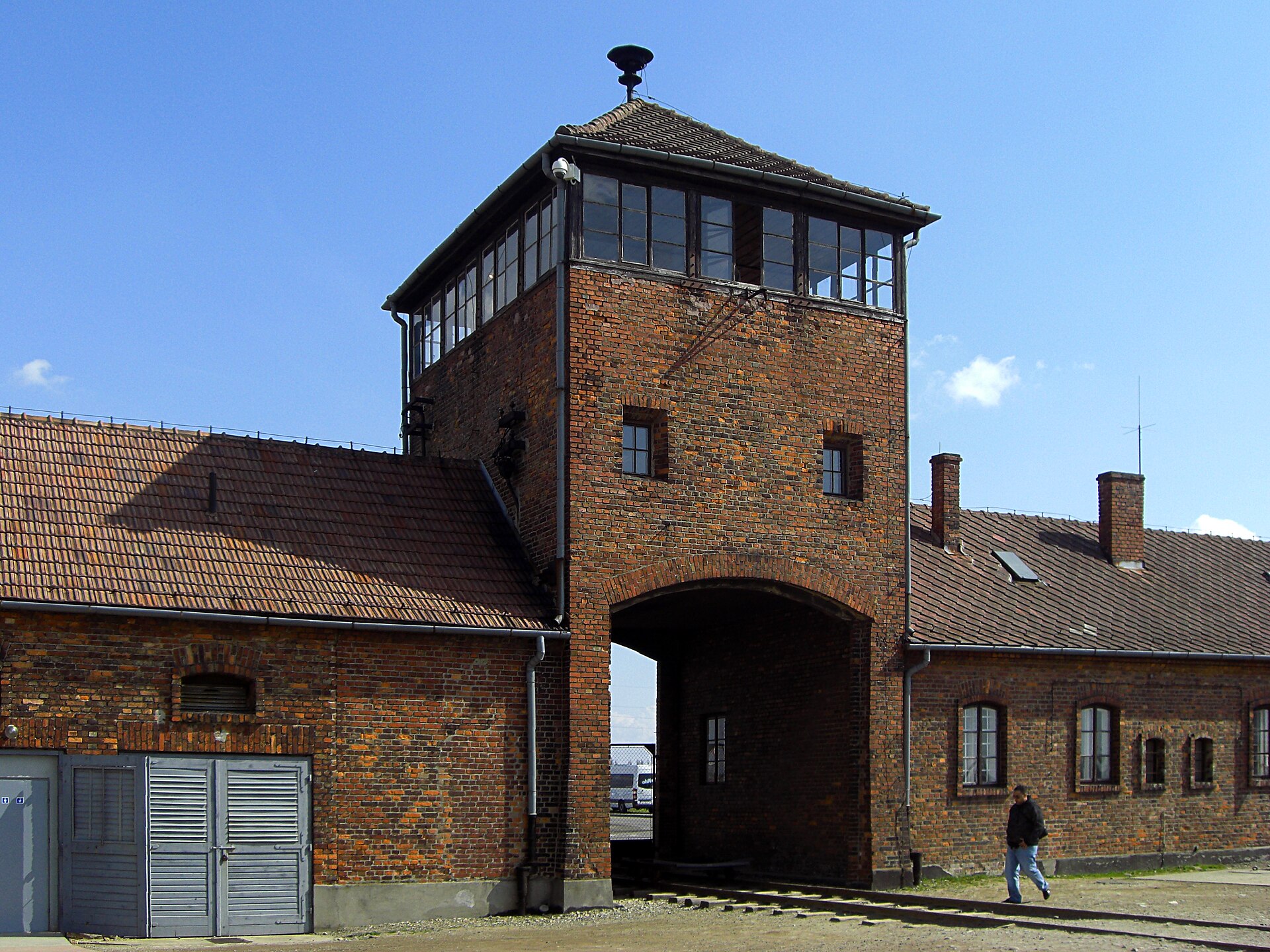 The gatehouse of the former Auschwitz II-Birkenau camp, part of the Auschwitz-Birkenau Memorial